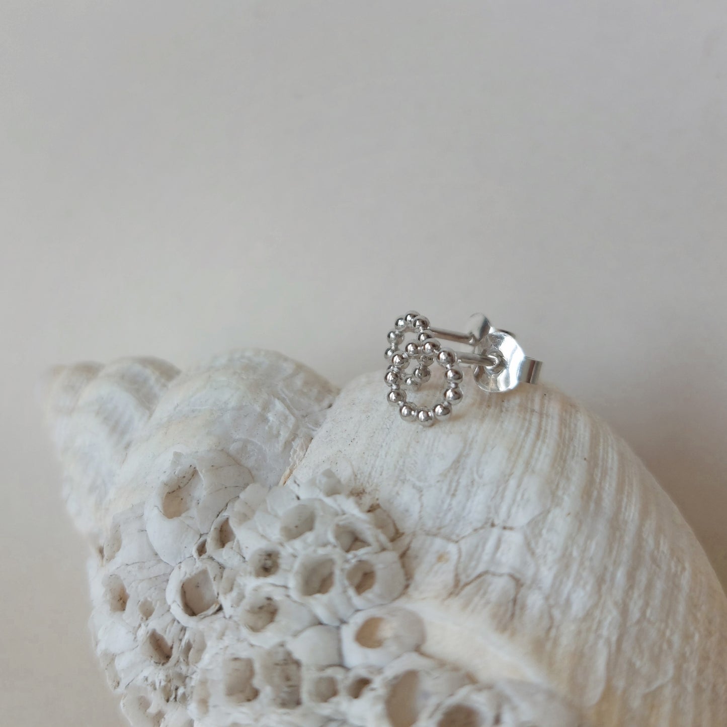 Pareldraad oorsteker