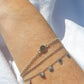 Zand armbandje gecombineerd met gelukmuntjes armband